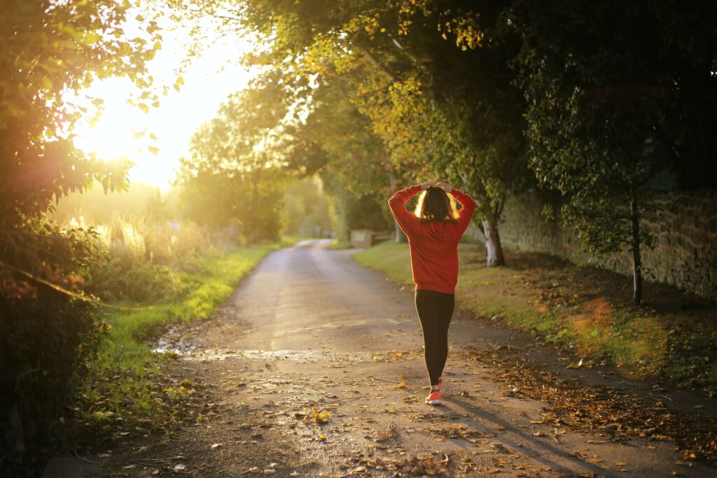 Woman running in woods