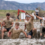 people at tough muddder in summer contiki