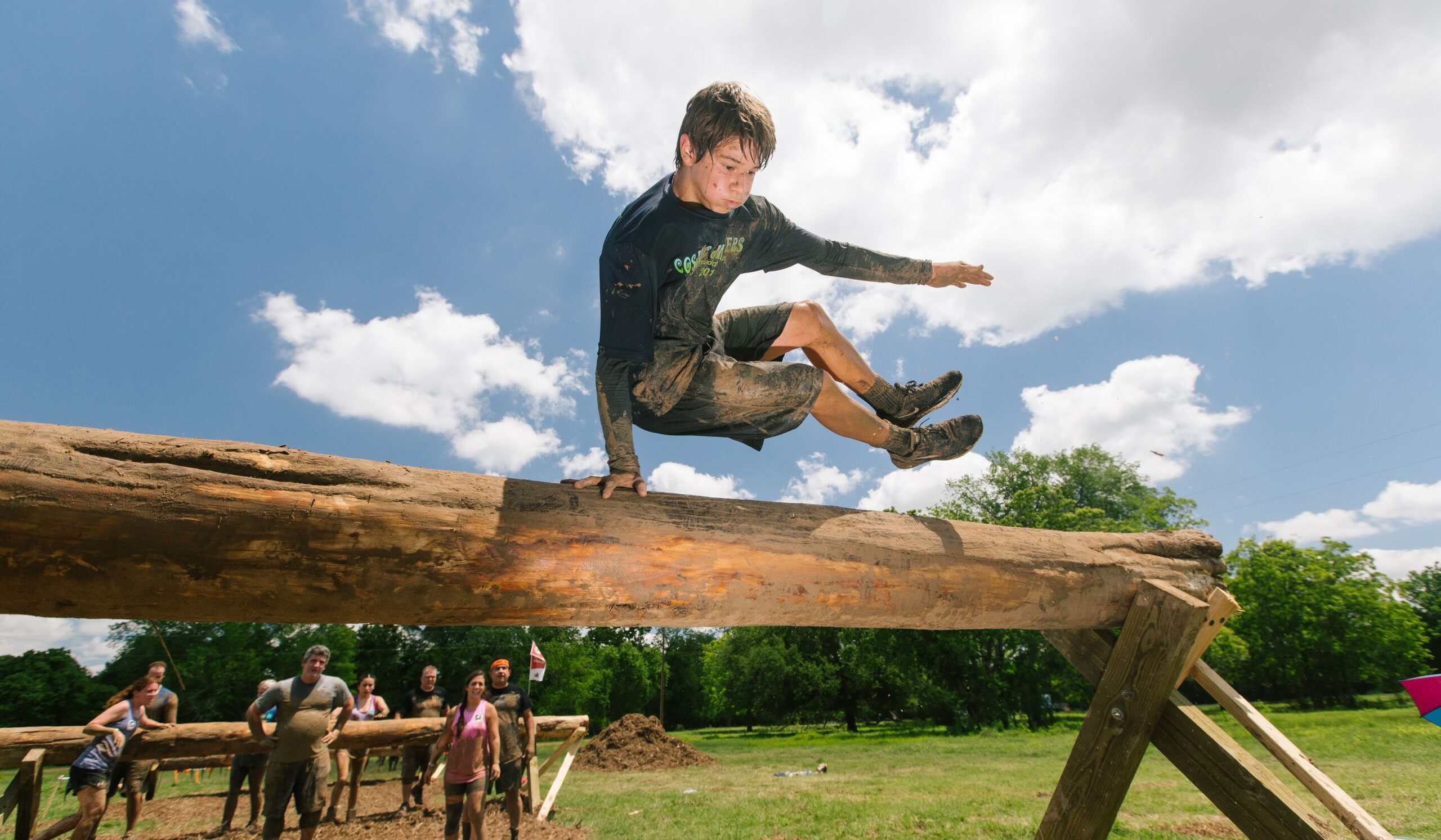 Participant jumped high on a barrier